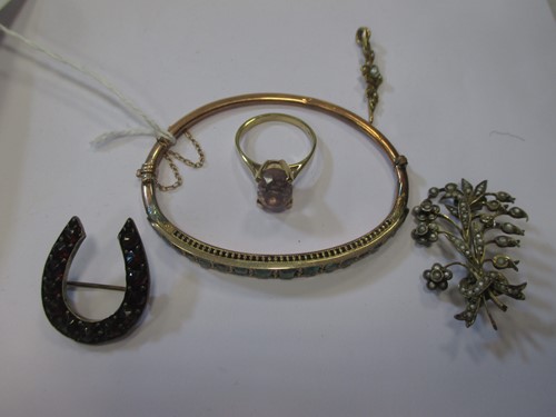 Lot 150 - A (probably) emerald set bangle, together with...