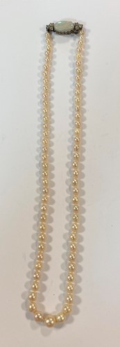 Lot 59 - A single row of graduated cultured pearls with an opal and diamond clasp