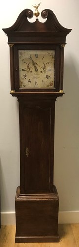 Lot 33 - A George III oak longcase clock