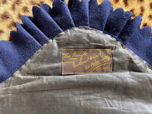 Lot 353 - A Leopard, (Panthera Pardus), a full skin rug by Roland Ward