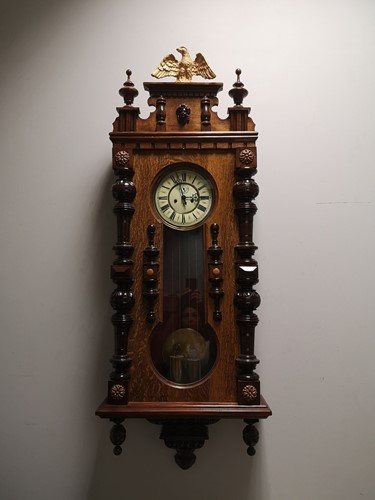 Lot 37 - A Vienna style oak wall clock
