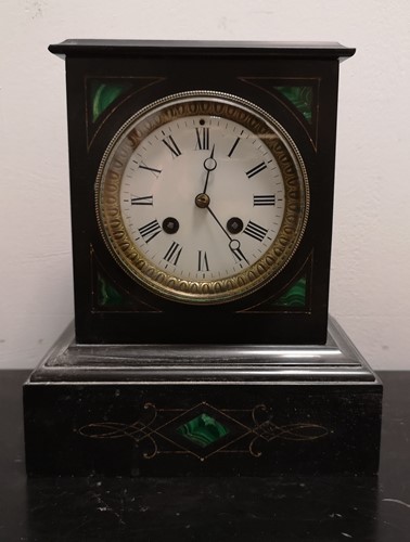 Lot 42 - A late Victorian black marble and malachite inlaid mantel clock