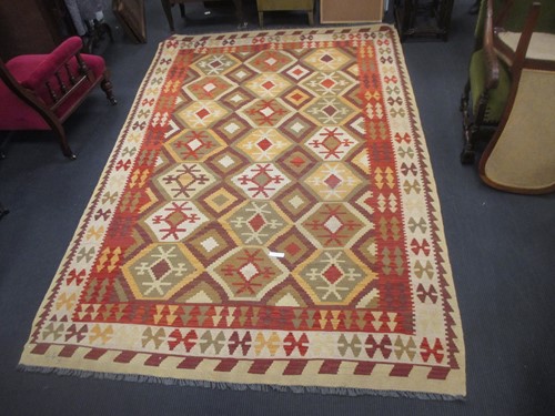 Lot 534 - A Kilim rug 304 x 200cm