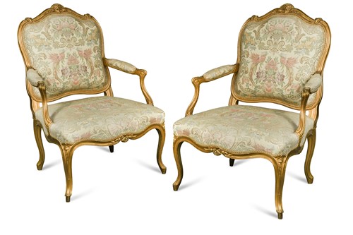 Lot 620 - A pair of Louis XV style gilt framed fauteuils, circa 1900