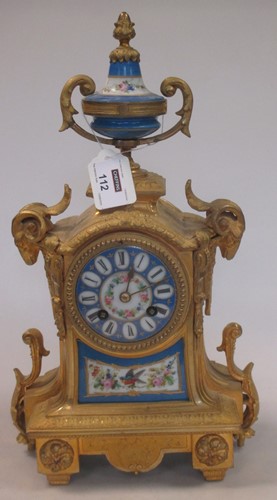 Lot 112 - A late 19th century French gilt metal and porcelain mounted mantel clock