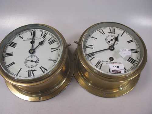 Lot 110 - Two circular brass cased ship's type timepieces