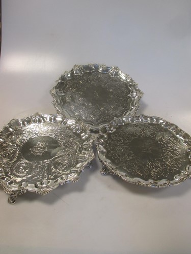 Lot 255 - Three Victorian silver waiters 40.7ozt gross (3)