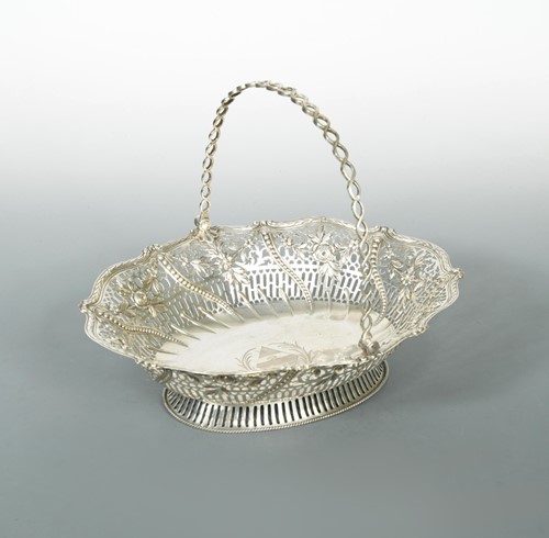 Lot 486 - A George III silver swing handled bread basket