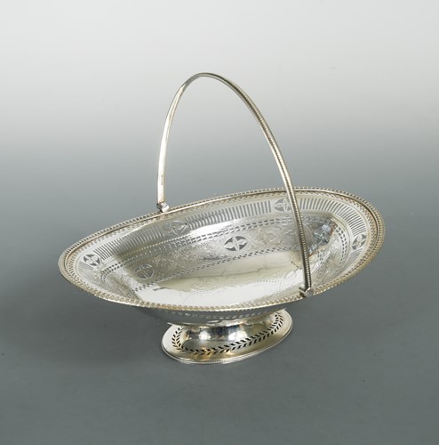 Lot 566 - A Victorian silver swing handled bread basket