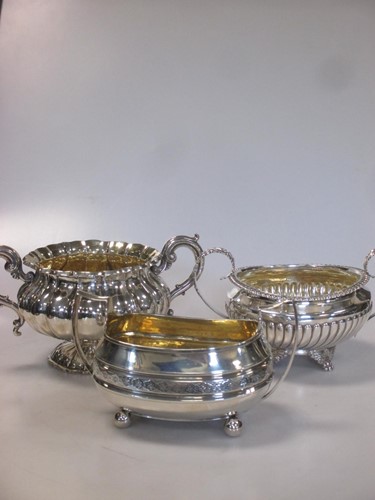 Lot 215 - Three Georgian silver sugar bowls. 33.3ozt...
