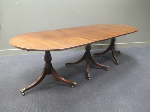 Lot 391 - A Regency style mahogany triple pedestal...
