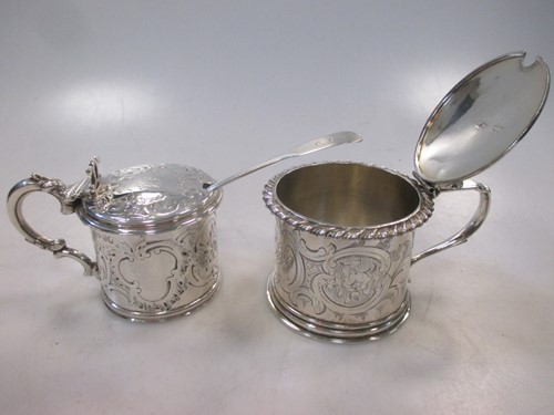 Lot 202 - Two Victorian silver drum mustards, one with...
