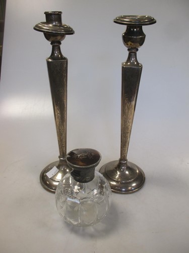 Lot 251 - A pair of candlesticks marked 'sterling' (some...