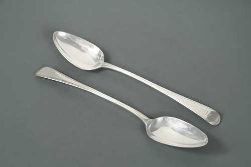 Lot 496 - A pair of George III silver basting spoons