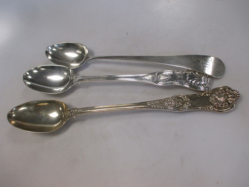 Lot 226 - A Georgian and two Victorian silver basting...