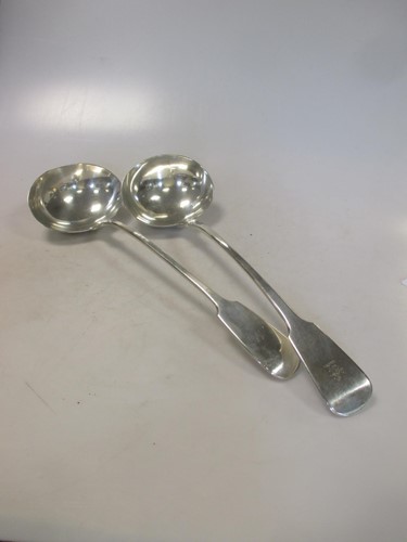 Lot 223 - A Georgian and a Victorian silver soup ladle,...