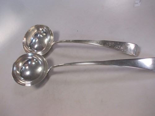 Lot 224 - Two Georgian silver soup ladles, one with...