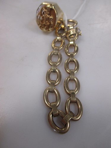 Lot 165 - A link bracelet marked '9ct', 12g, together...