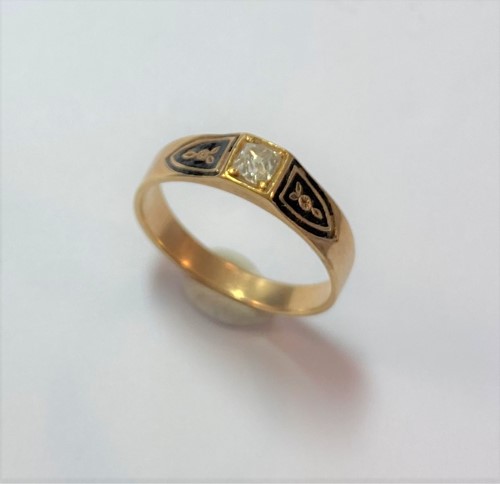 Lot 48 - A diamond and black enamel memorial ring