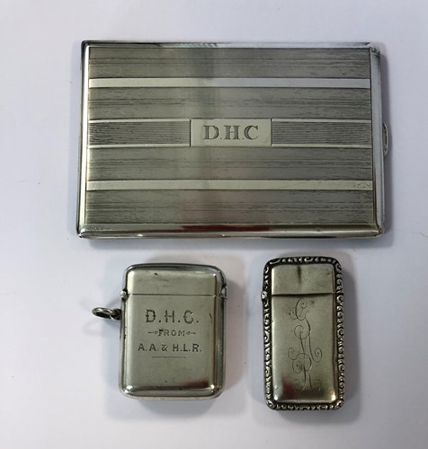 Lot 367 - An Edward VII silver vesta by Sampson Mordan, another vesta and a pocket cigarette case