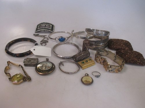 Lot 180 - A collection of silver, white metal and...