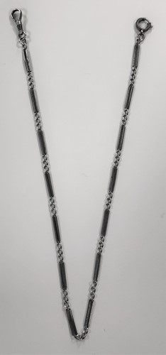 Lot 254 - A white metal and black enamel 'Albertina' chain
