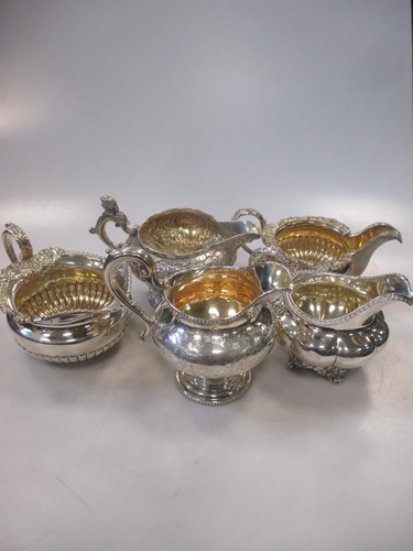 Lot 203 - A collection of 5 silver cream jugs, 39.7ozt...
