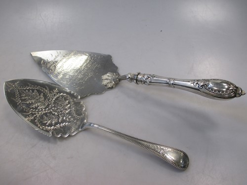 Lot 201 - Two Victorian silver serving trowels, one with...