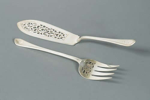 Lot 555 - A pair of Victorian silver fish servers