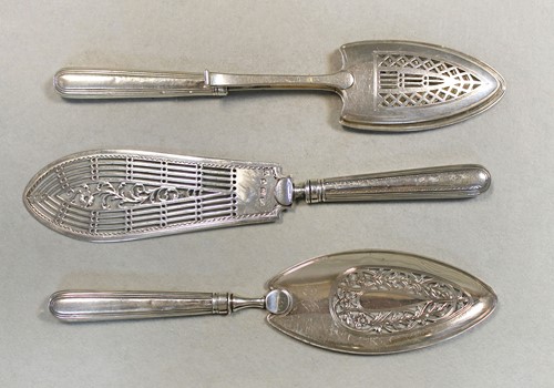 Lot 335 - Three George III 18th century silver serving blades