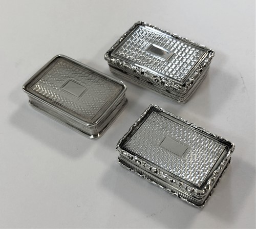 Lot 369 - A trio of 19th Century silver miniature vinaigrettes