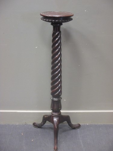 Lot 642 - A Victorian mahogany bed-post torchere