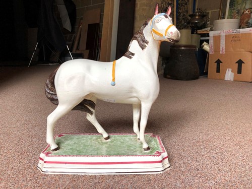 Lot 70 - A fine and rare Leeds pottery horse, circa 1825