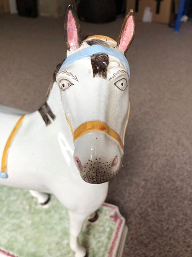 Lot 70 - A fine and rare Leeds pottery horse, circa 1825