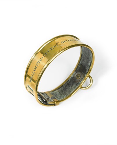 Lot 95 - A brass dog collar, early 19th century