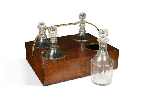 Lot 39 - A mahogany decanter carrier with brass handles, in the George III style