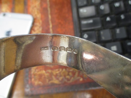 Lot 213 - Three pairs of silver asparagus tongs 16.7ozt...