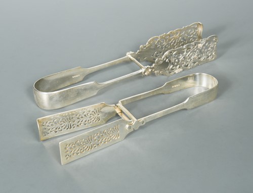 Lot 552 - Two pairs of Victorian silver asparagus tongs