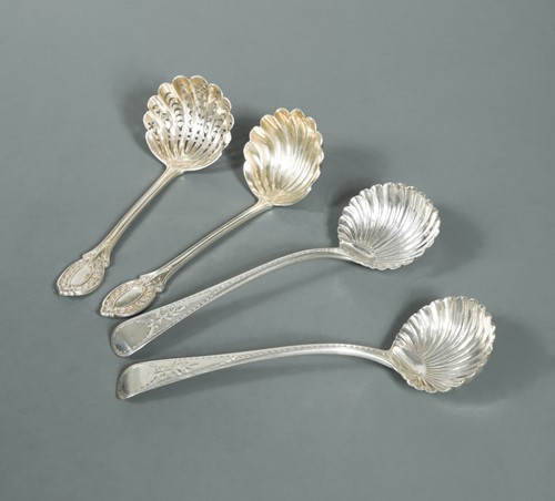 Lot 536 - A pair of George IV silver sauce ladles, together with a Victorian pair
