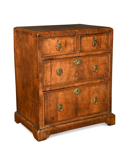 Lot 20 - A George II walnut and cross banded miniature chest, circa 1730