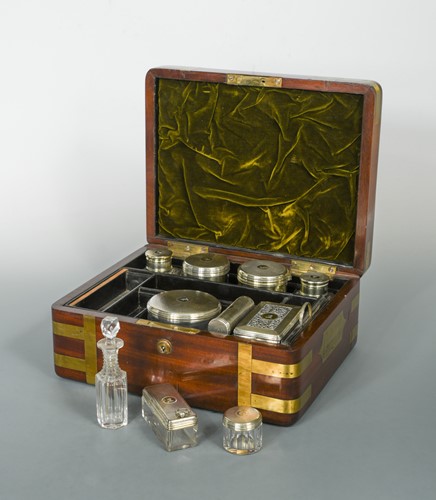 Lot 42 - A George IV mahogany brass bound dressing case