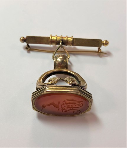 Lot 285 - A fob seal currently attached to a bar brooch