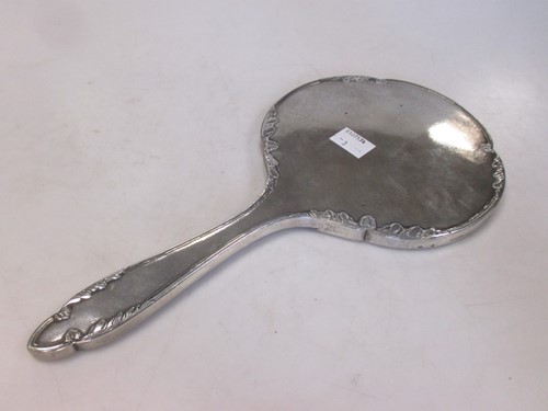 Lot 258 - A Chinese silver mirror