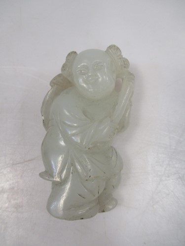 Lot 132 - A Chinese jade figure 5.5cm high