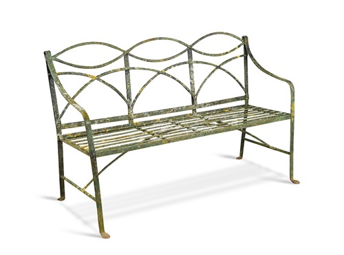 Lot 154 - A Regency iron garden seat