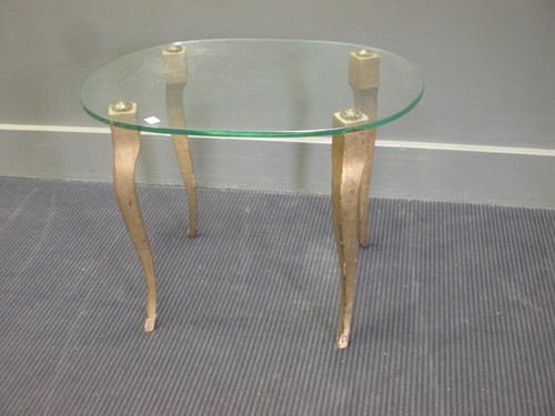 Lot 467 - A glass top coffee table on gilt legs 40 x 60...