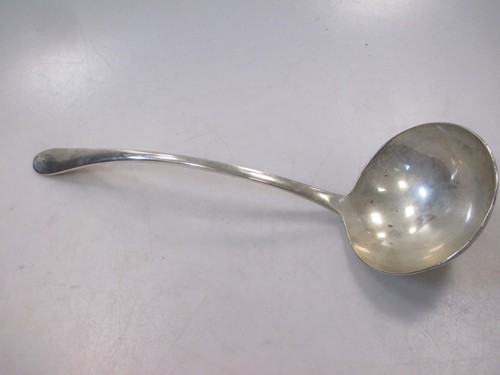 Lot 205 - An Elkington silver soup ladle, 20th century,...