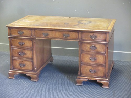 Lot 397 - A George III style twin pedestal desk, 20th...