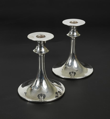 Lot 126 - David Andersen, a pair of Norwegian metalwares candlesticks