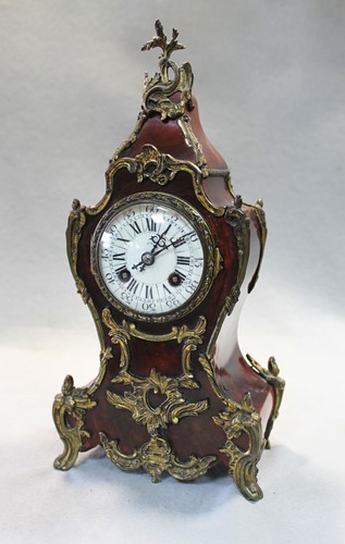 Lot 843 - A French tortoiseshell mantel clock, late 19th century